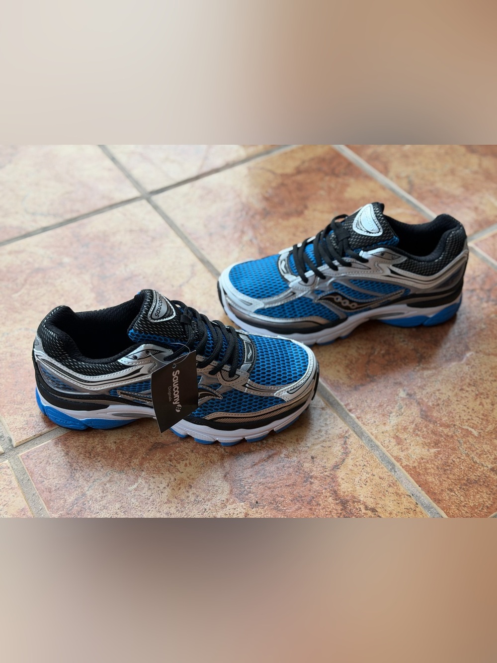 Size 9.5 Men’s And Women’s 11 - Saucony Blue and Black Mesh Athletic Sneakers